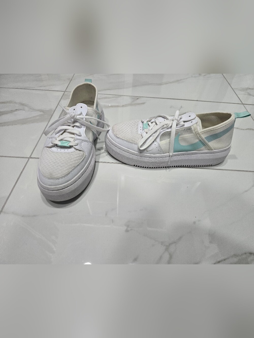 Nike Women’s White Sneakers with Mint Accents